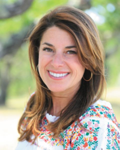 Connie Guttersen smiling in the photo